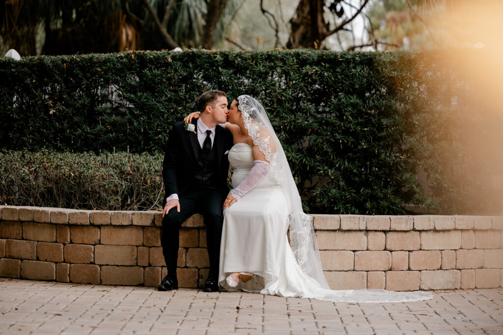 Bride and groom on the garden path at Dr. Phillips House